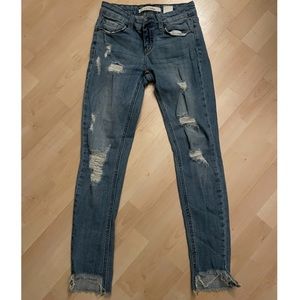 Ripped Low Rise Skinny Jeans